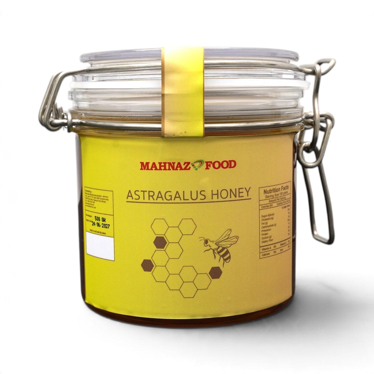 Mahnaz Food Astragalus Honey in a clear glass jar with a yellow label and metal swing-top lid