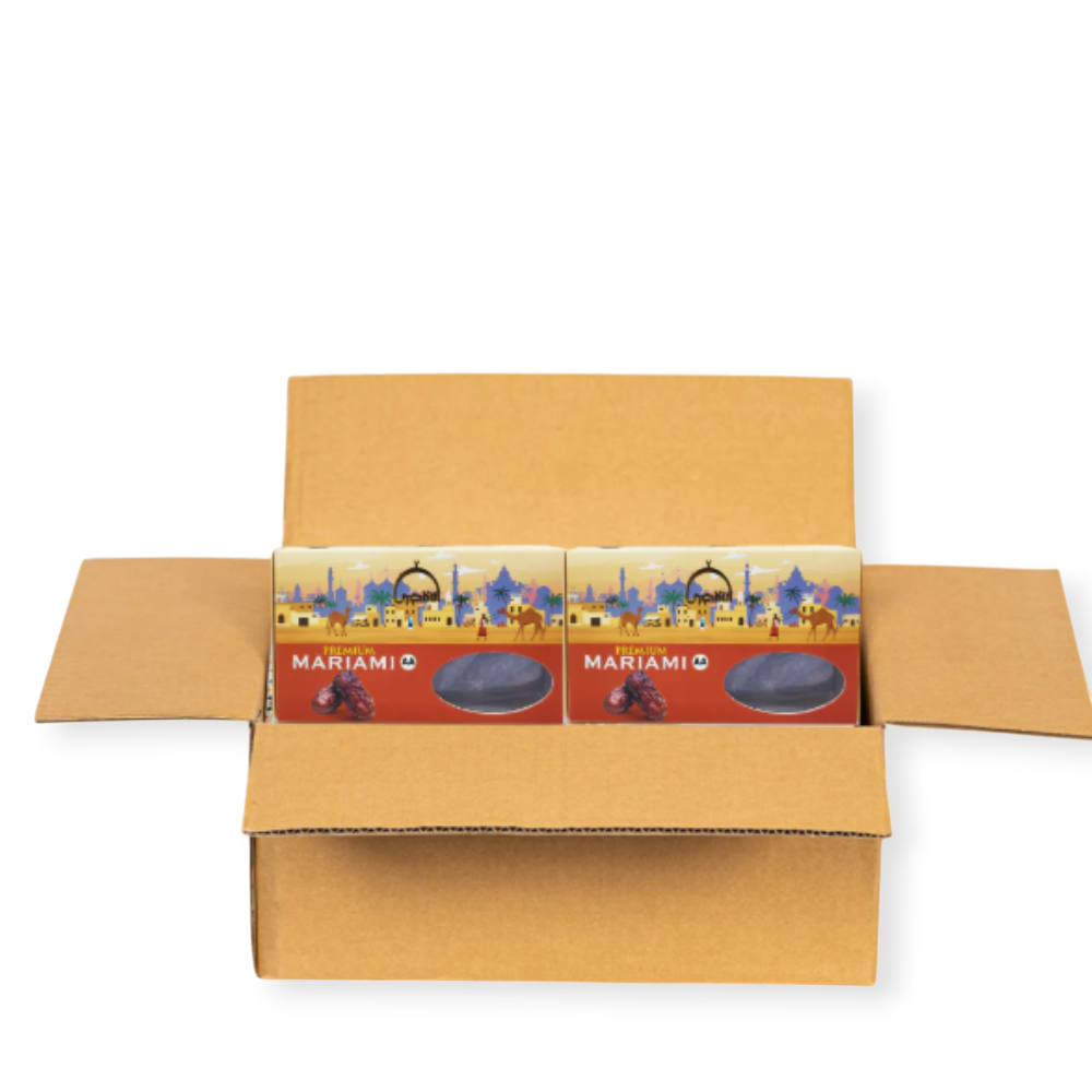 Mahnaz Food wholesale box containing two packages of premium Mariami dates with desert-themed packaging.