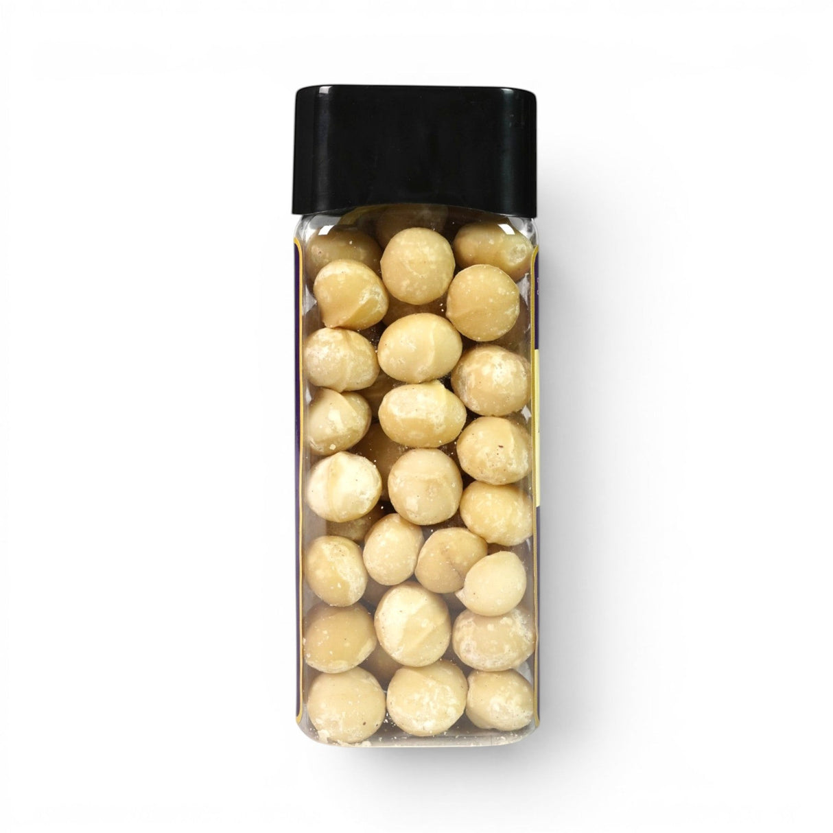 Mahnaz Food premium macadamia nuts in a clear rectangular plastic container with a black lid, top-down view.