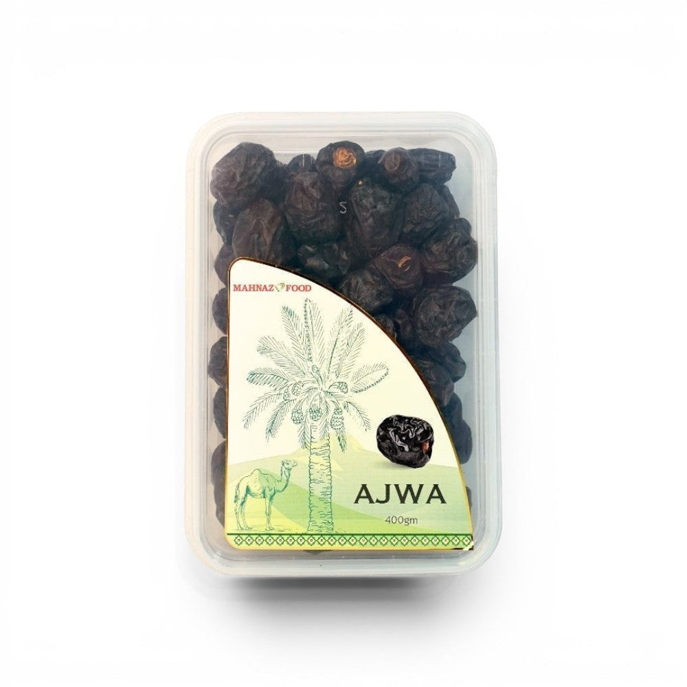 Mahnaz Food Madinah Ajwa dates, dark brown, soft, wrinkled, premium organic dates in a clear plastic container.