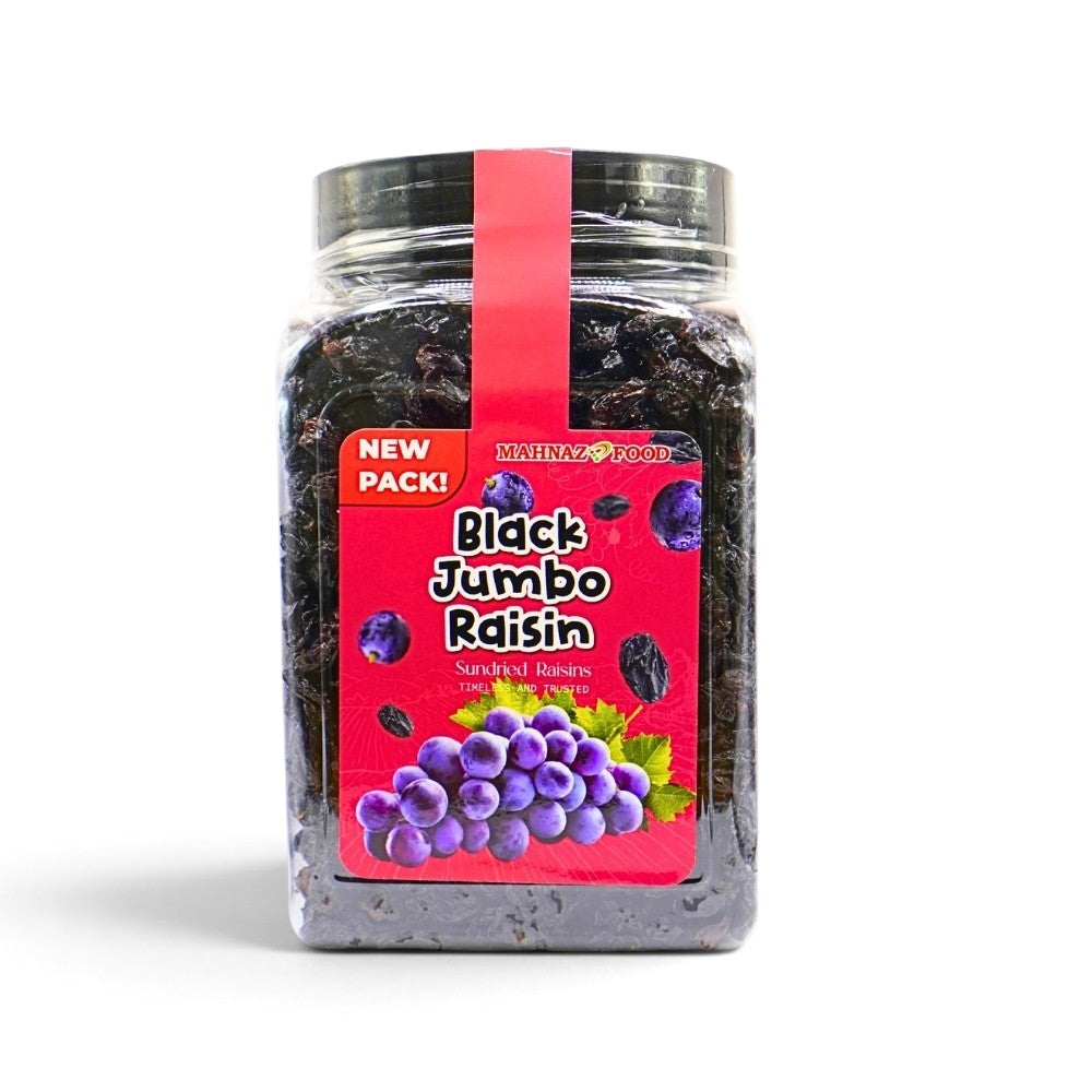 Mahnaz Food black jumbo raisins in a clear plastic jar with a red label featuring grape illustrations