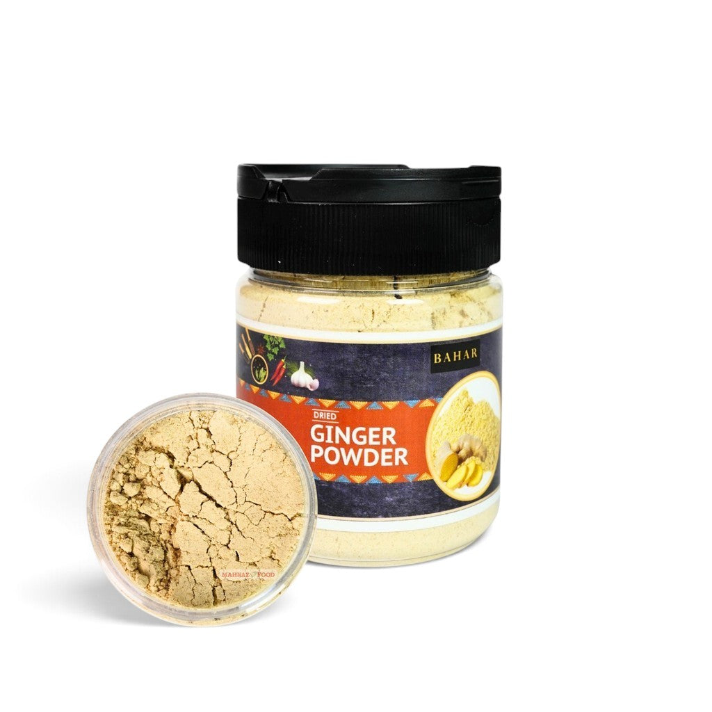 Mahnaz Food premium dried ginger powder in a clear plastic jar with a black lid, showing fine light brown texture.