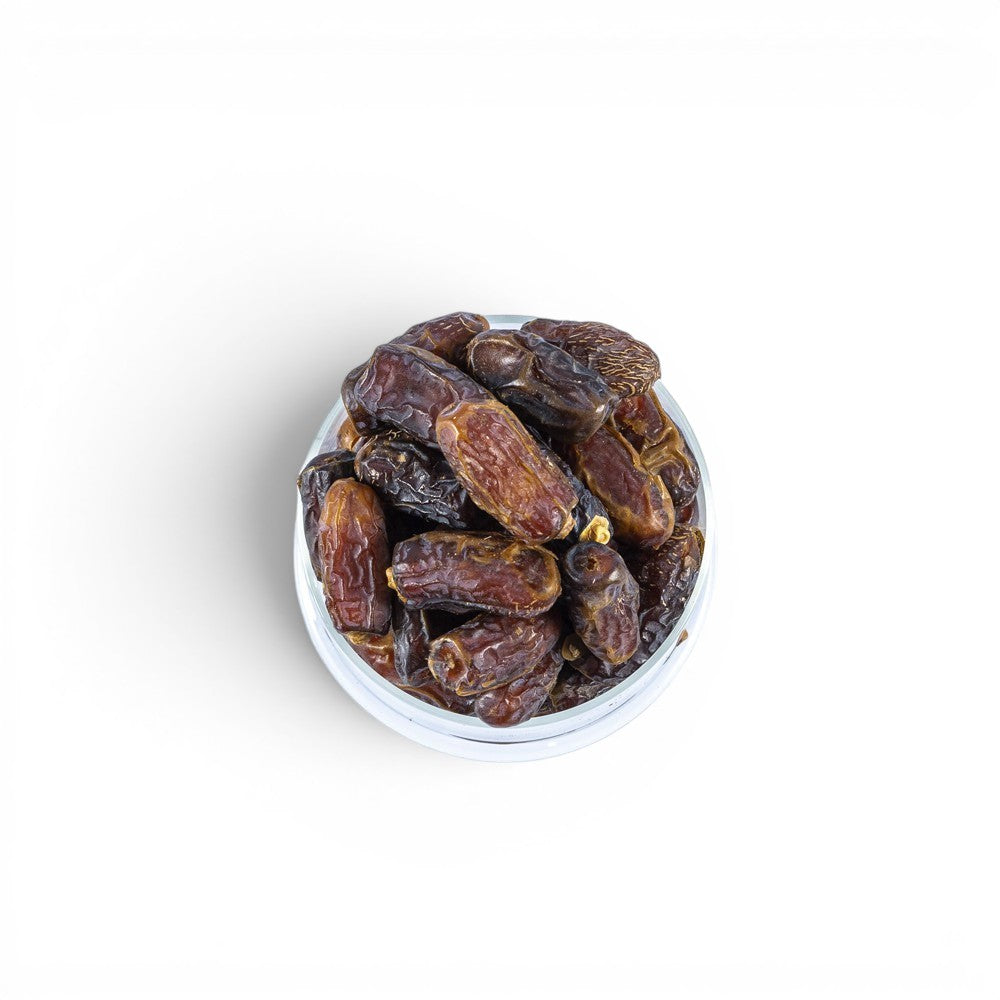 Mahnaz Food Mariami Dates, golden to dark brown, soft, sweet, chewy texture, premium quality.
