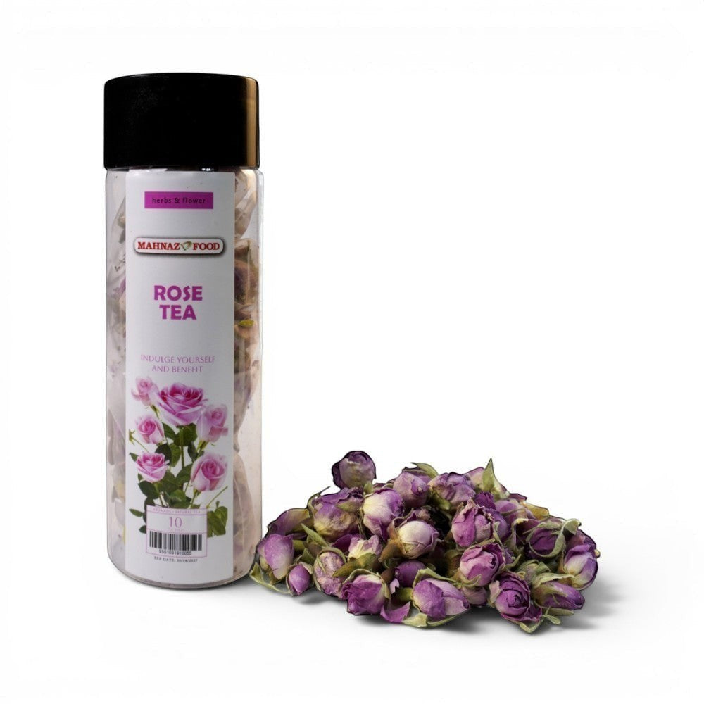 Mahnaz Food Rose Tea in a clear jar with a black lid, next to a pile of dried rose buds. Premium dried rose petals.