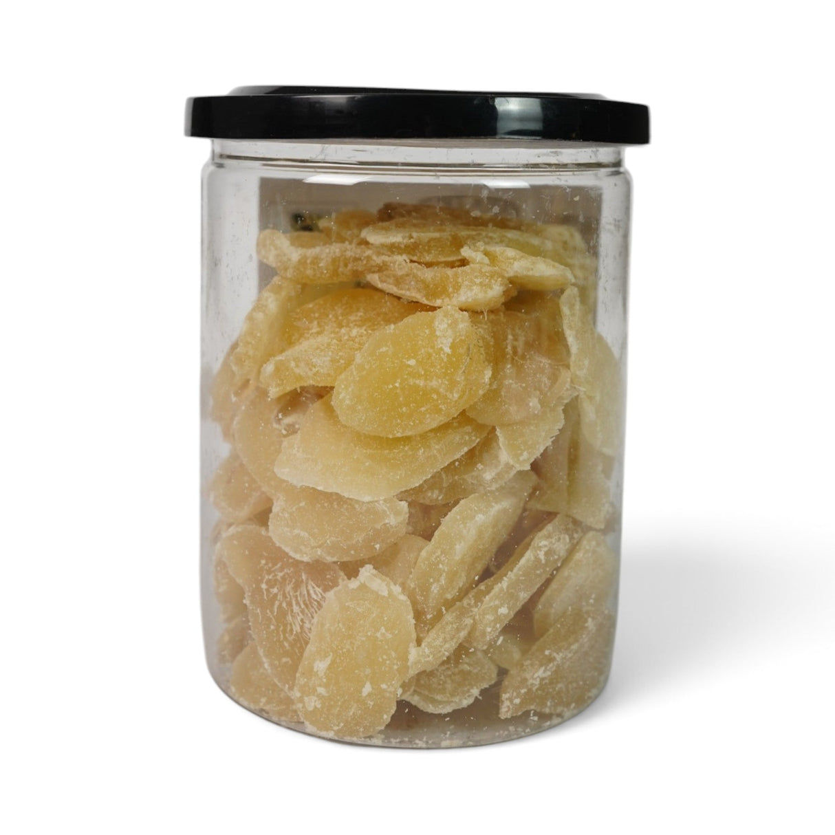 Mahnaz Food dried ginger slices in a clear plastic jar with a black lid, featuring a sweet and spicy snack.