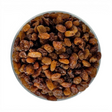 Mahnaz Food bowl filled with sweet dried sultana raisins, a healthy snack rich in fiber and antioxidants.