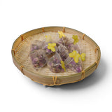 Mahnaz Food Rose Tea sachets filled with dried rose petals, presented in a bamboo basket with yellow butterfly accents.