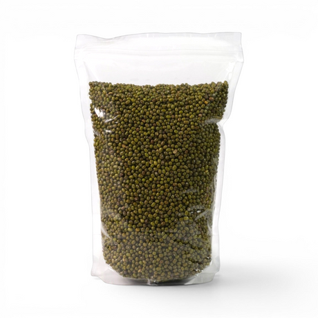 Mahnaz Food raw green mung beans in a clear plastic pantry storage bag on a white background
