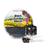 Mahnaz Food black jumbo raisins in a clear round container with a vineyard label and a glass serving dish