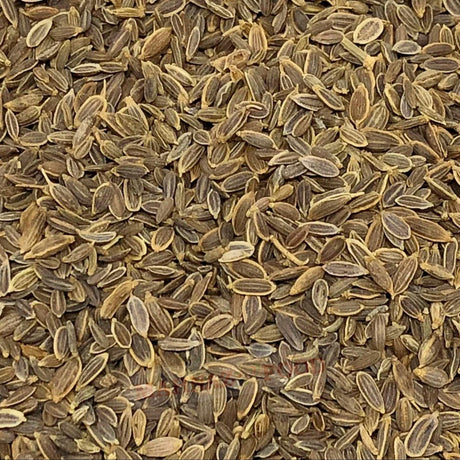 Close-up of premium Mahnaz Food dill seeds, showing their aromatic, oval-shaped texture for cooking and pickling.