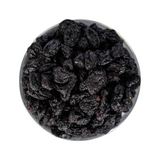 Mahnaz Food jumbo black raisins in a glass bowl, a healthy dried fruit snack rich in fiber and antioxidants.