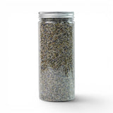 Mahnaz Food lavender tea loose dried flowers in a clear jar with a silver lid, perfect for calming herbal infusions.