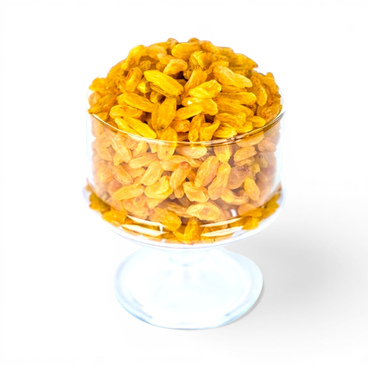 Mahnaz Food long golden raisins piled high in a clear glass pedestal bowl against a white background.