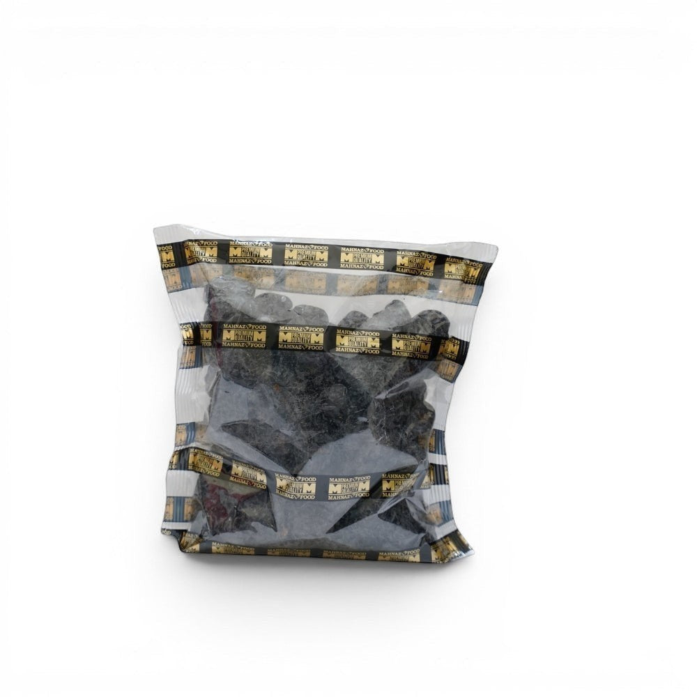 Mahnaz Food Madinah Ajwa dates are dark brown, soft, and wrinkled, packaged in a clear bag with branded tape.