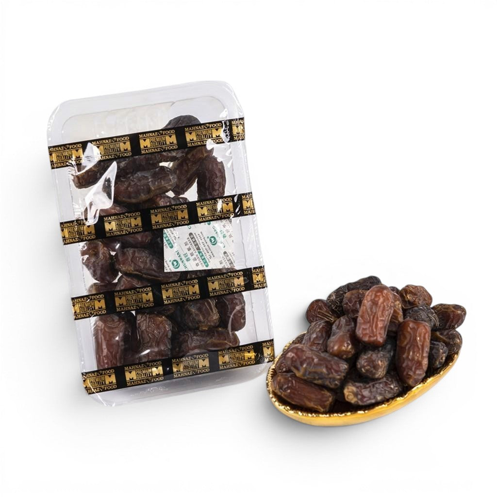 Mahnaz Food Mariami dates, golden to dark brown, soft, sweet, chewy texture, packed and in a golden dish.