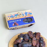 Mahnaz Food Premium Mariami Dates in various sizes, golden to dark brown with chewy texture, perfect for snacking or gifting.