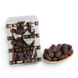 Mahnaz Food Mariami dates, golden to dark brown, with soft, sweet flesh and chewy texture, in packaging and a gold dish.