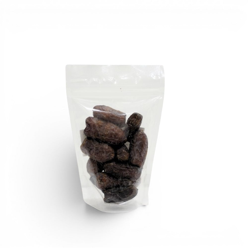 Mahnaz Food Mariami Dates in a clear resealable pouch, dark brown, soft, chewy, and naturally sweet.