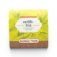 Mahnaz Food nettle tea box with green nettle leaf illustrations and yellow background. Naturally caffeine-free.