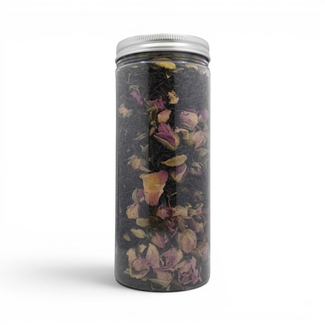 Mahnaz Food Royal Black Tea loose leaf blend with dried rose petals in a clear jar. 120g.