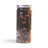 Mahnaz Food Royal Green Tea loose leaf blend with dried rose petals in a clear jar. 120g.