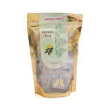 Mahnaz Food Senna Tea in a gold resealable pouch, featuring 10 individually wrapped teabags with natural herbal leaves.