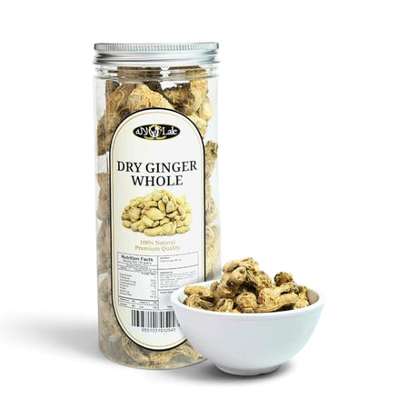 Mahnaz Food whole dried ginger root in a clear plastic jar with a small white bowl of ginger pieces in front